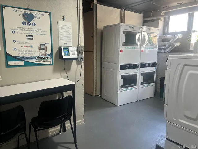 a kitchen with stainless steel appliances a stove a refrigerator and cabinets