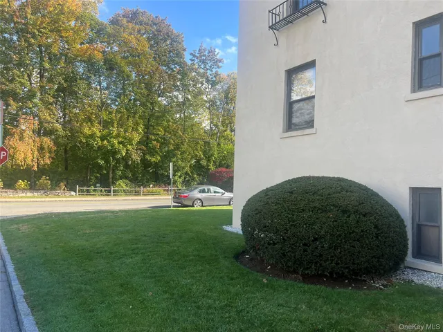 a view of a backyard with garden
