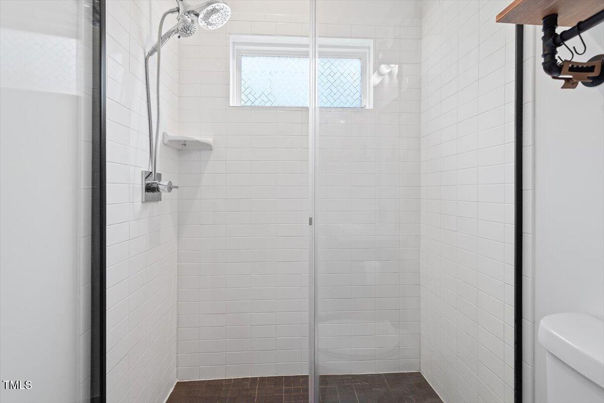 1314 South East Street Raleigh, NC 27601 - Photo 28 of 39 a bathroom with a shower
