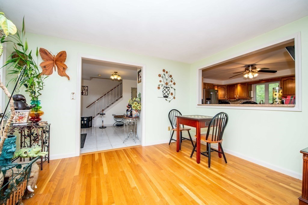 5 Chief Lane Canton, MA 02021 - Photo 19 of 42 a dining room with furniture and wooden floor