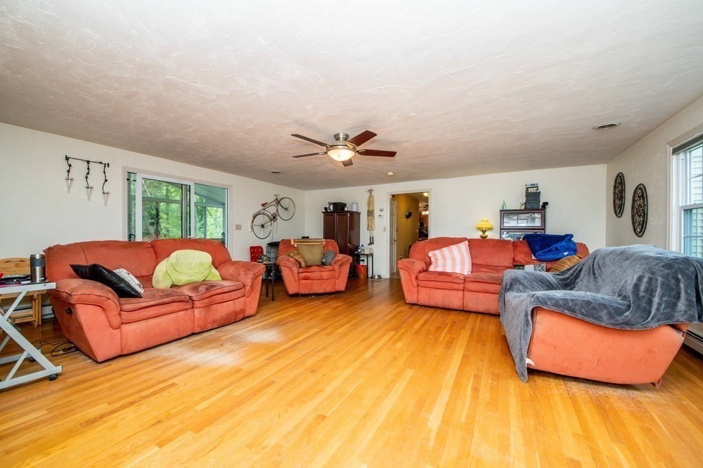 5 Chief Lane Canton, MA 02021 - Photo 23 of 42 a bedroom with furniture and a large window