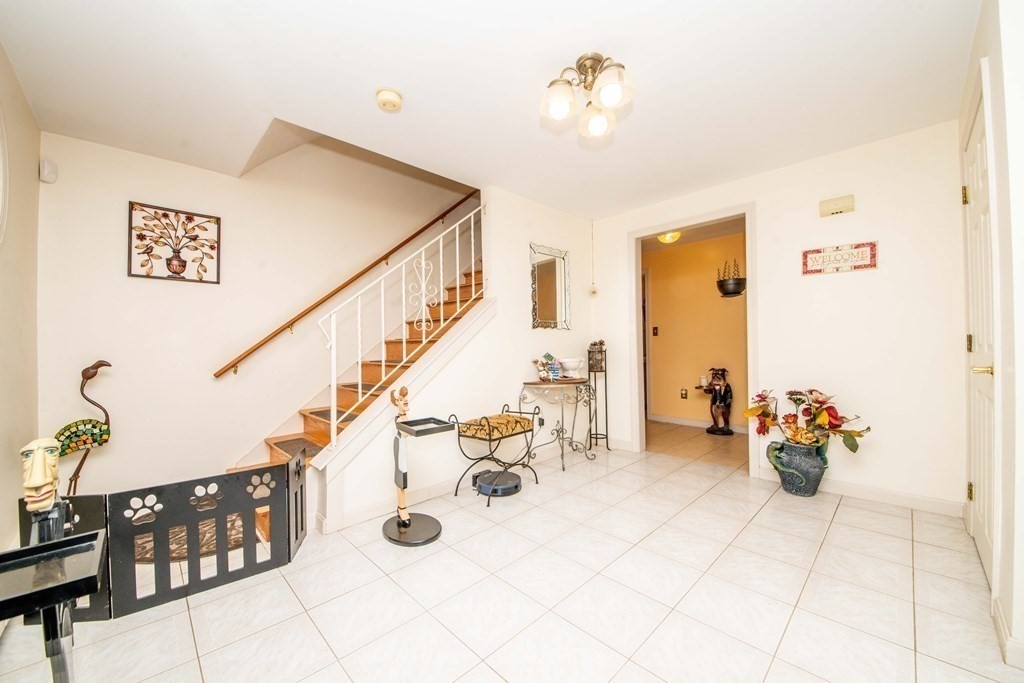 5 Chief Lane Canton, MA 02021 - Photo 27 of 42 a view of livingroom with furniture and toys