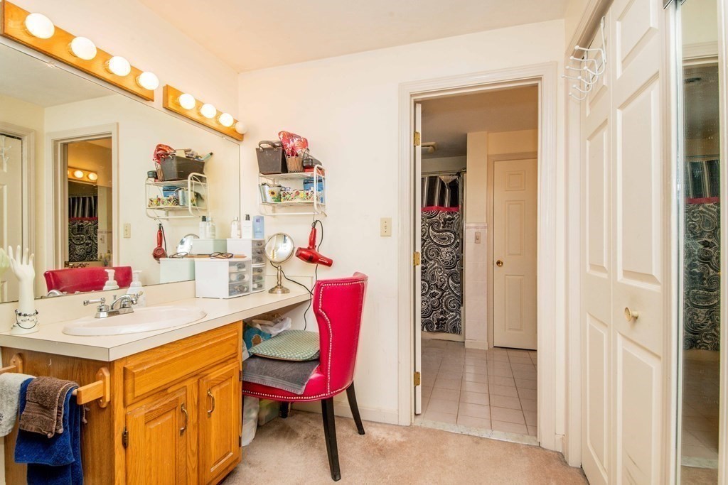 5 Chief Lane Canton, MA 02021 - Photo 30 of 42 a dining room with a table and chairs