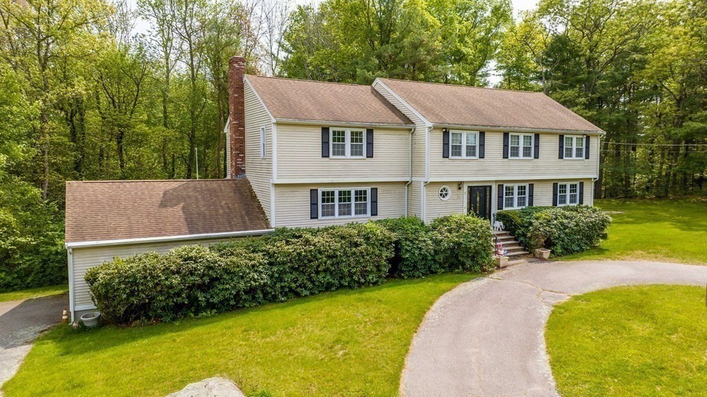 5 Chief Lane Canton, MA 02021 - Photo 3 of 42 a aerial view of a house having swimming pool
