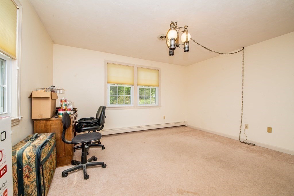 5 Chief Lane Canton, MA 02021 - Photo 32 of 42 a view of a workspace with furniture and a window