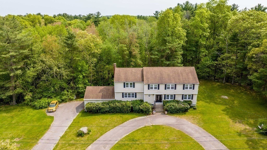 5 Chief Lane Canton, MA 02021 - Photo 4 of 42 a view of a house with pool and a yard