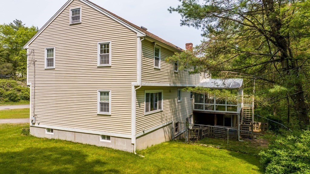 5 Chief Lane Canton, MA 02021 - Photo 42 of 42 a view of a house with a yard