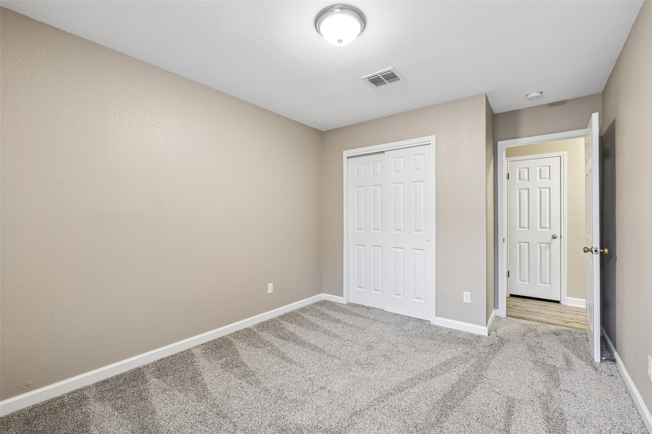 152 Grant Way Kyle, TX 78640 - Photo 34 of 39 wooden floor in a room