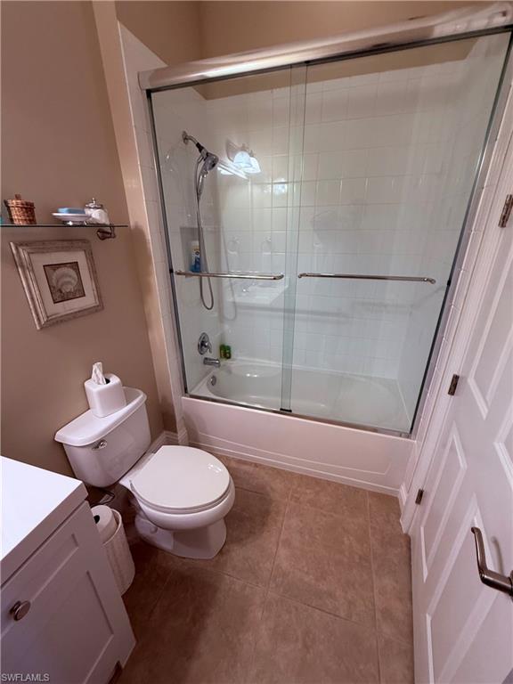 7543 Moorgate Point Way Naples, FL 34113 - Photo 31 of 31 a bathroom with a toilet and a shower