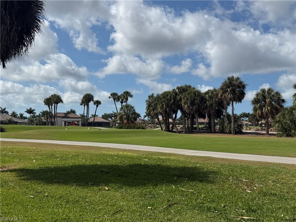 7543 Moorgate Point Way Naples, FL 34113 - Photo 8 of 31 a view of a golf course