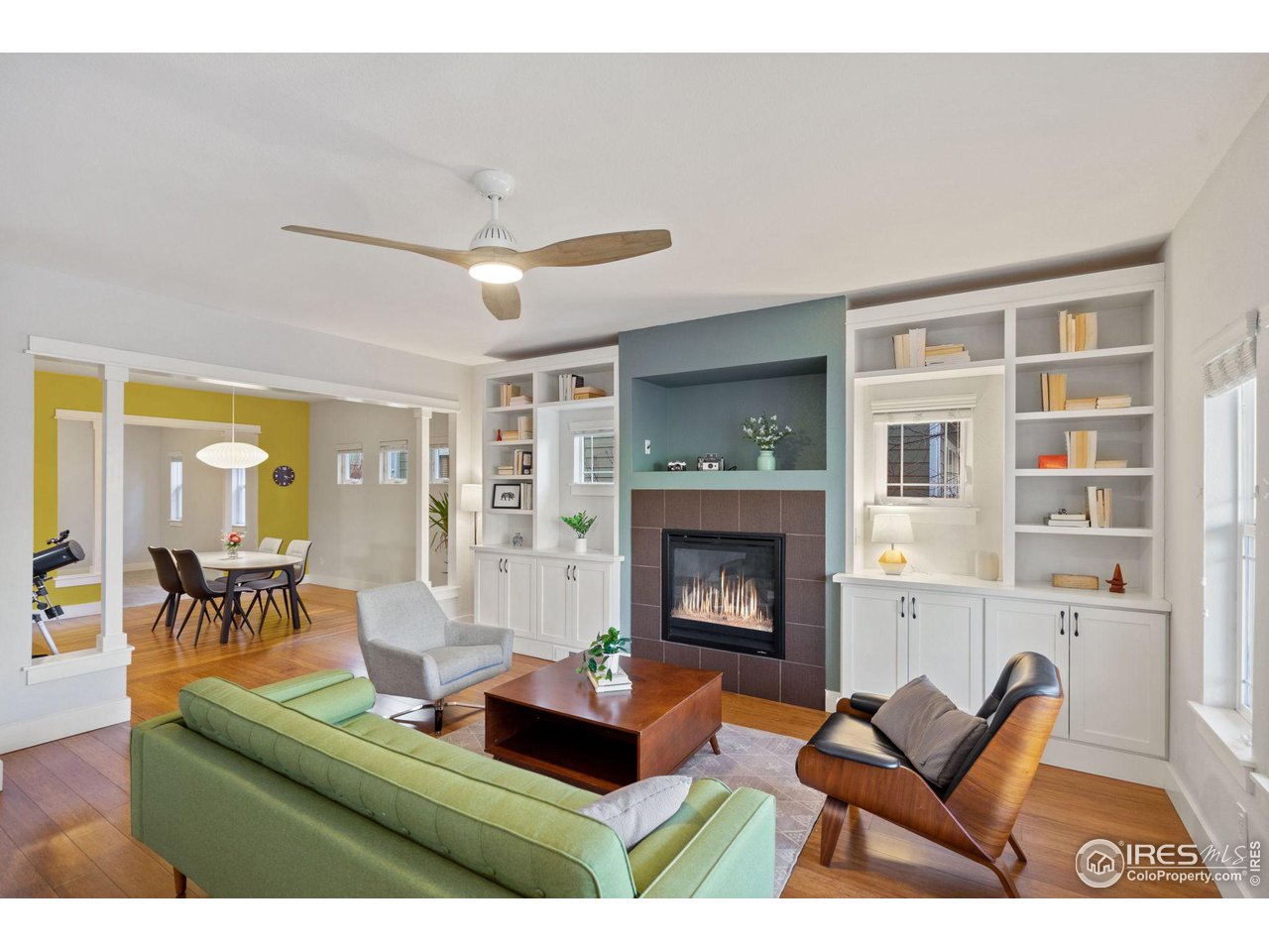 2263 Bellwether Lane Fort Collins, CO 80521 - Photo 11 of 40 a living room with furniture and a fireplace