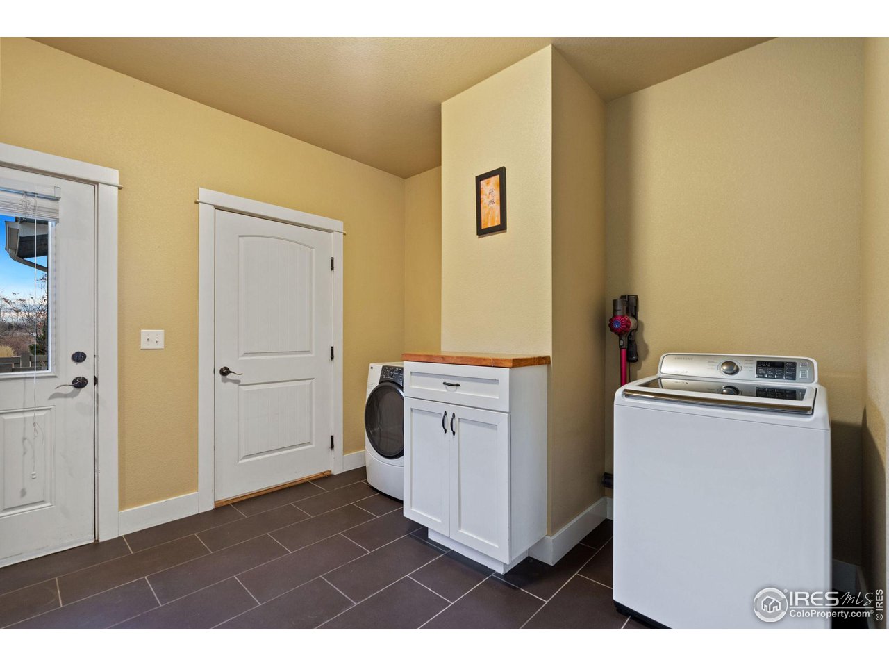 2263 Bellwether Lane Fort Collins, CO 80521 - Photo 26 of 40 a utility room with dryer and washer