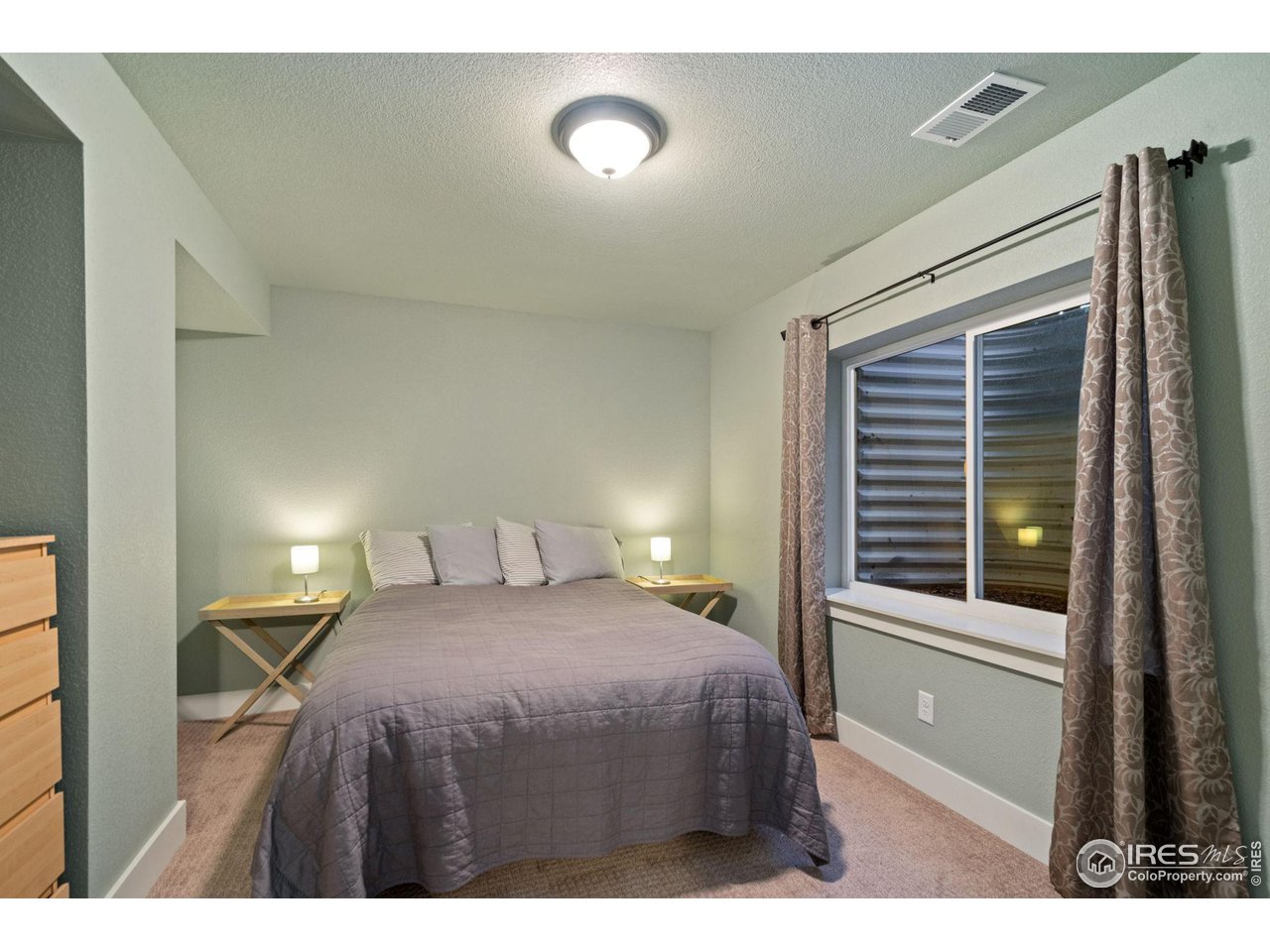 2263 Bellwether Lane Fort Collins, CO 80521 - Photo 30 of 40 a bedroom with a bed and a window