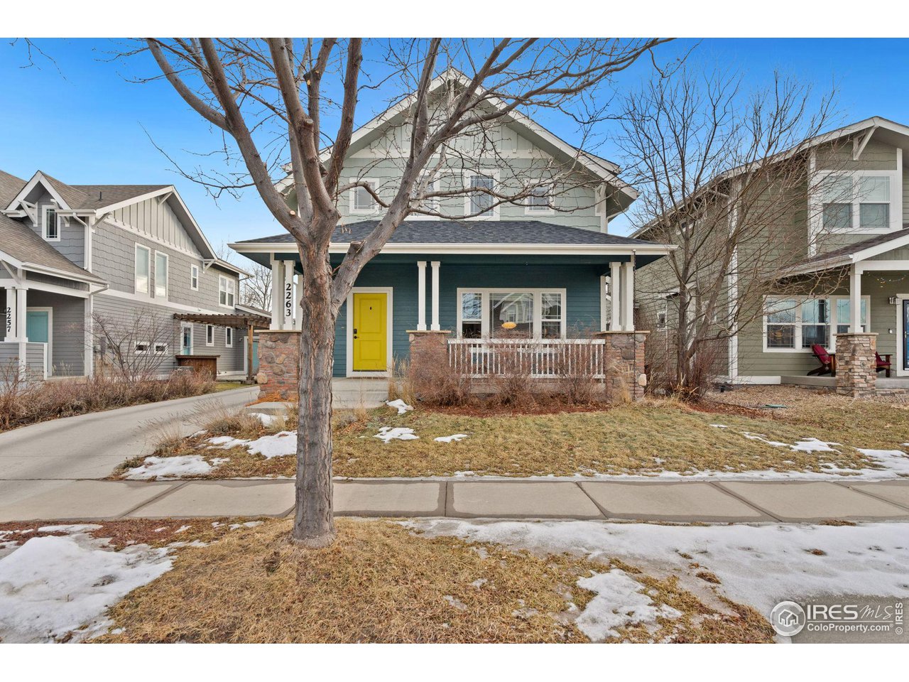 2263 Bellwether Lane Fort Collins, CO 80521 - Photo 3 of 40 a view of a town with large tree