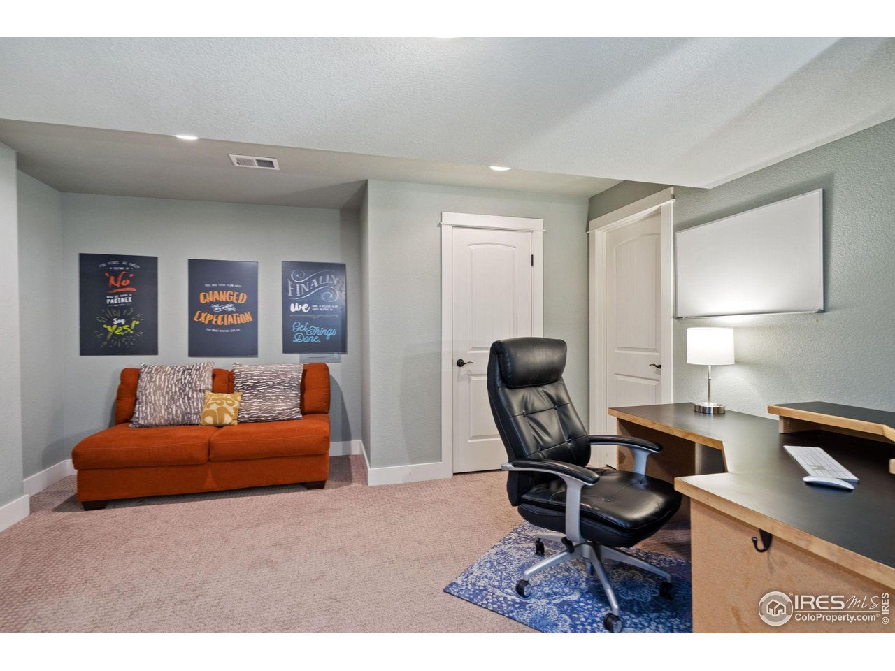 2263 Bellwether Lane Fort Collins, CO 80521 - Photo 31 of 40 a workspace with furniture and a couch