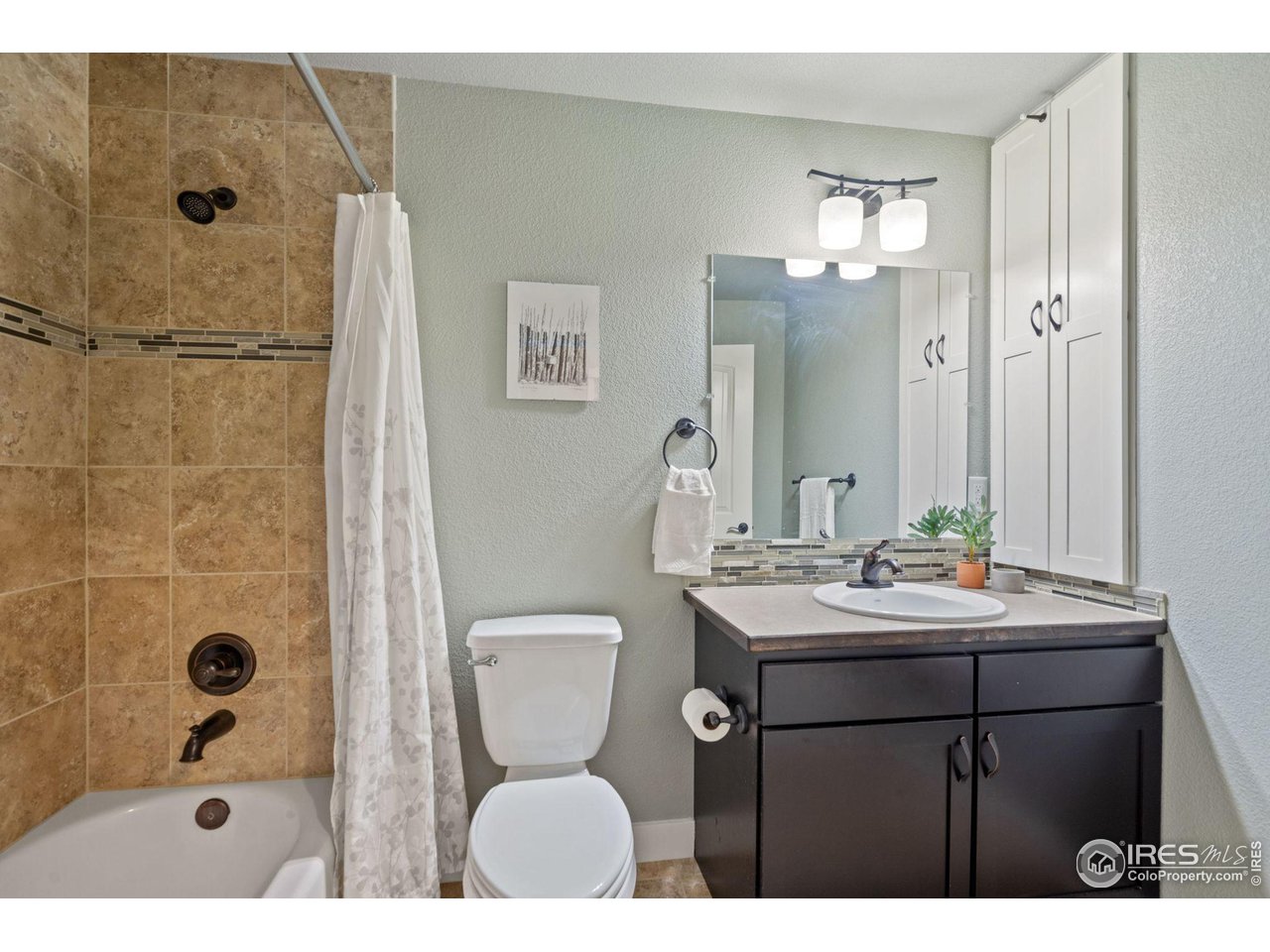 2263 Bellwether Lane Fort Collins, CO 80521 - Photo 33 of 40 a bathroom with a sink toilet and shower