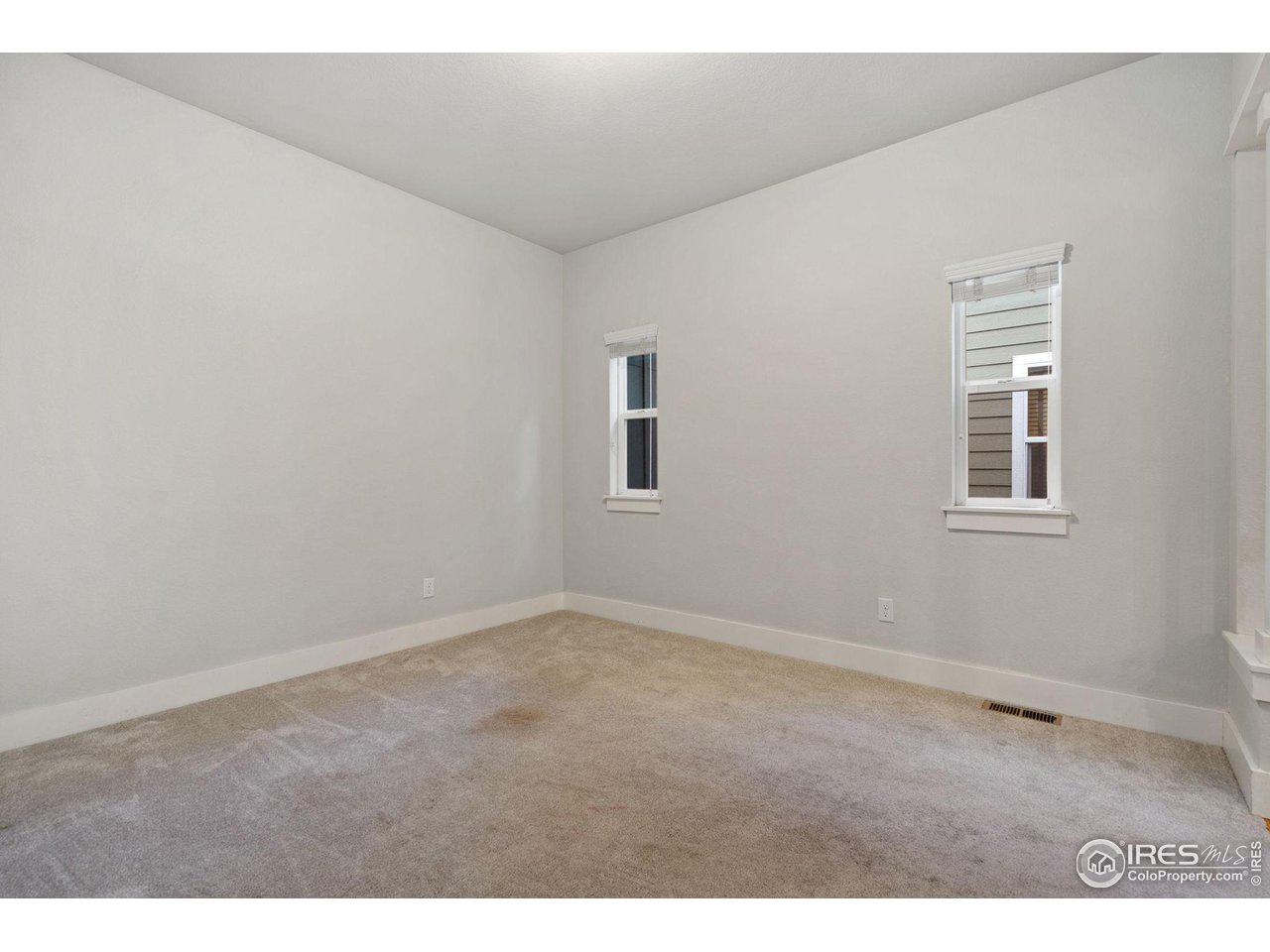 2263 Bellwether Lane Fort Collins, CO 80521 - Photo 8 of 40 a view of an empty room with a window