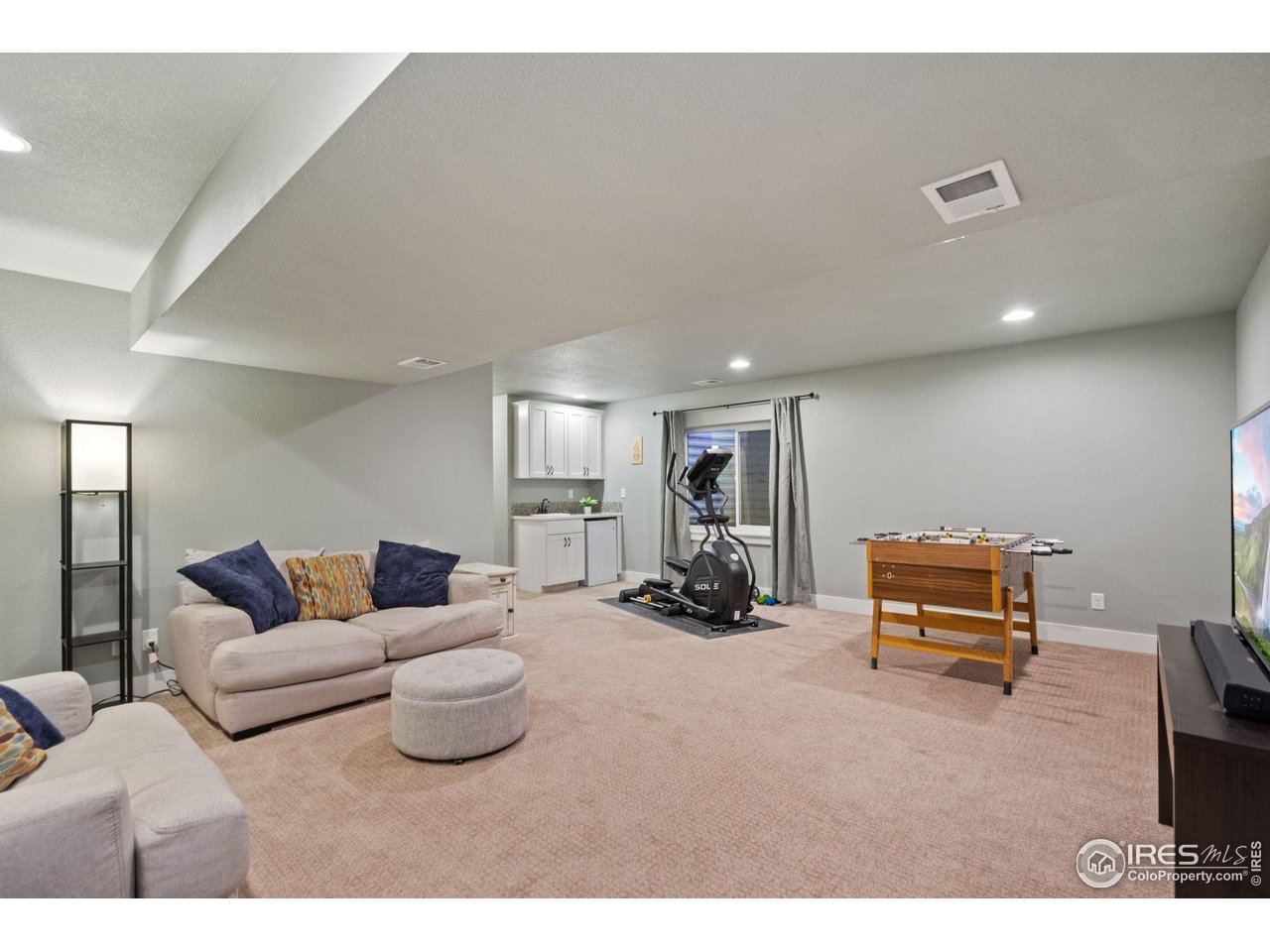 2263 Bellwether Lane Fort Collins, CO 80521 - Photo 10 of 40 a living room with furniture and a couch
