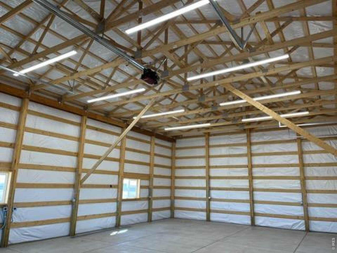13550 Deter-Winters Road Byers, CO 80103 - Photo 12 of 50 The barn has a 16' ceiling height and an exceptional overhead lighting system