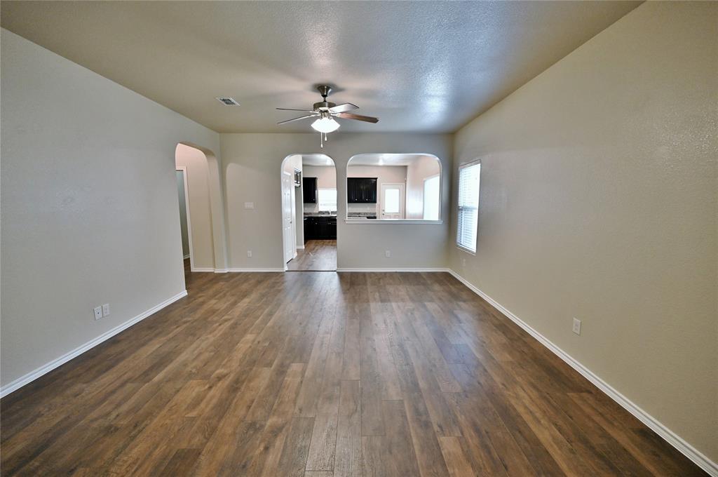 916 Iona Drive Fort Worth, TX 76120 - Photo 16 of 40 Living facing Kitchen & Dining