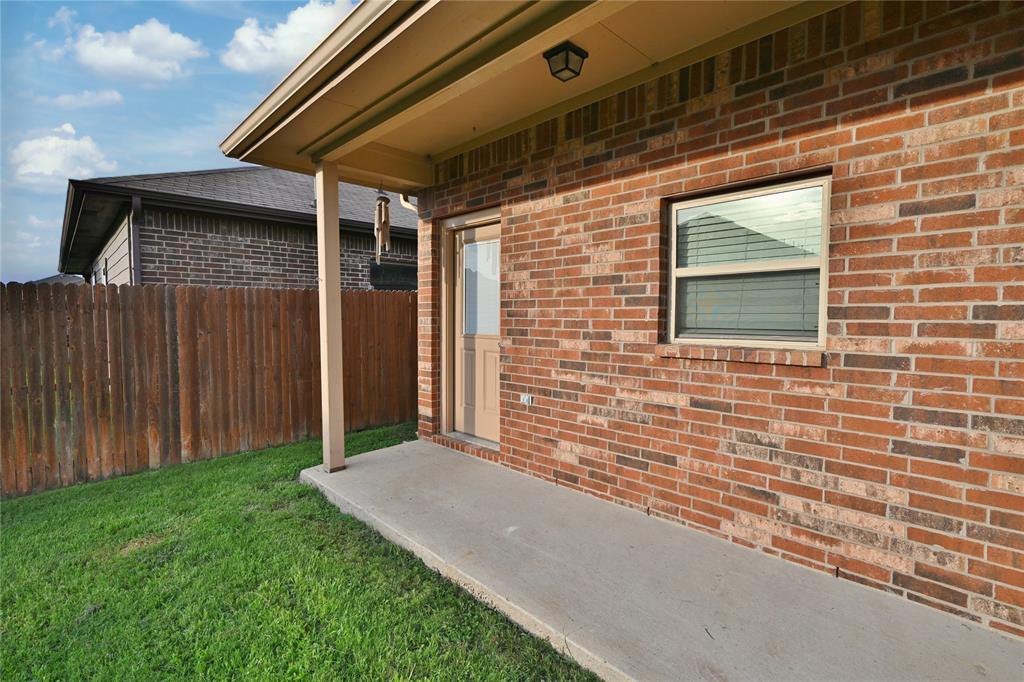 916 Iona Drive Fort Worth, TX 76120 - Photo 38 of 40 Covered back Patio