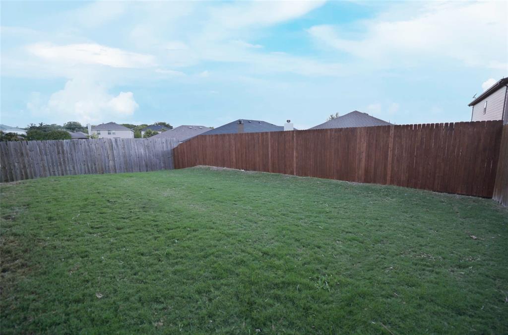 916 Iona Drive Fort Worth, TX 76120 - Photo 40 of 40 New rear stained privacy fence