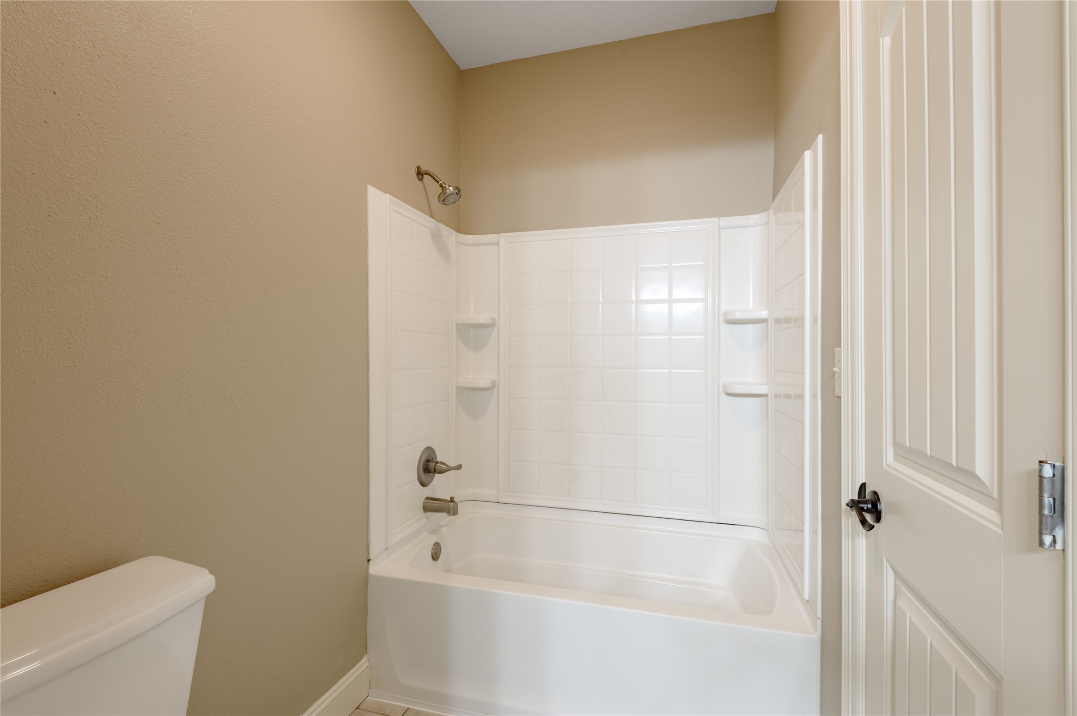 3134 Nursery Road Livingston, TX 77351 - Photo 33 of 50 a white bath tub sitting next to a white toilet