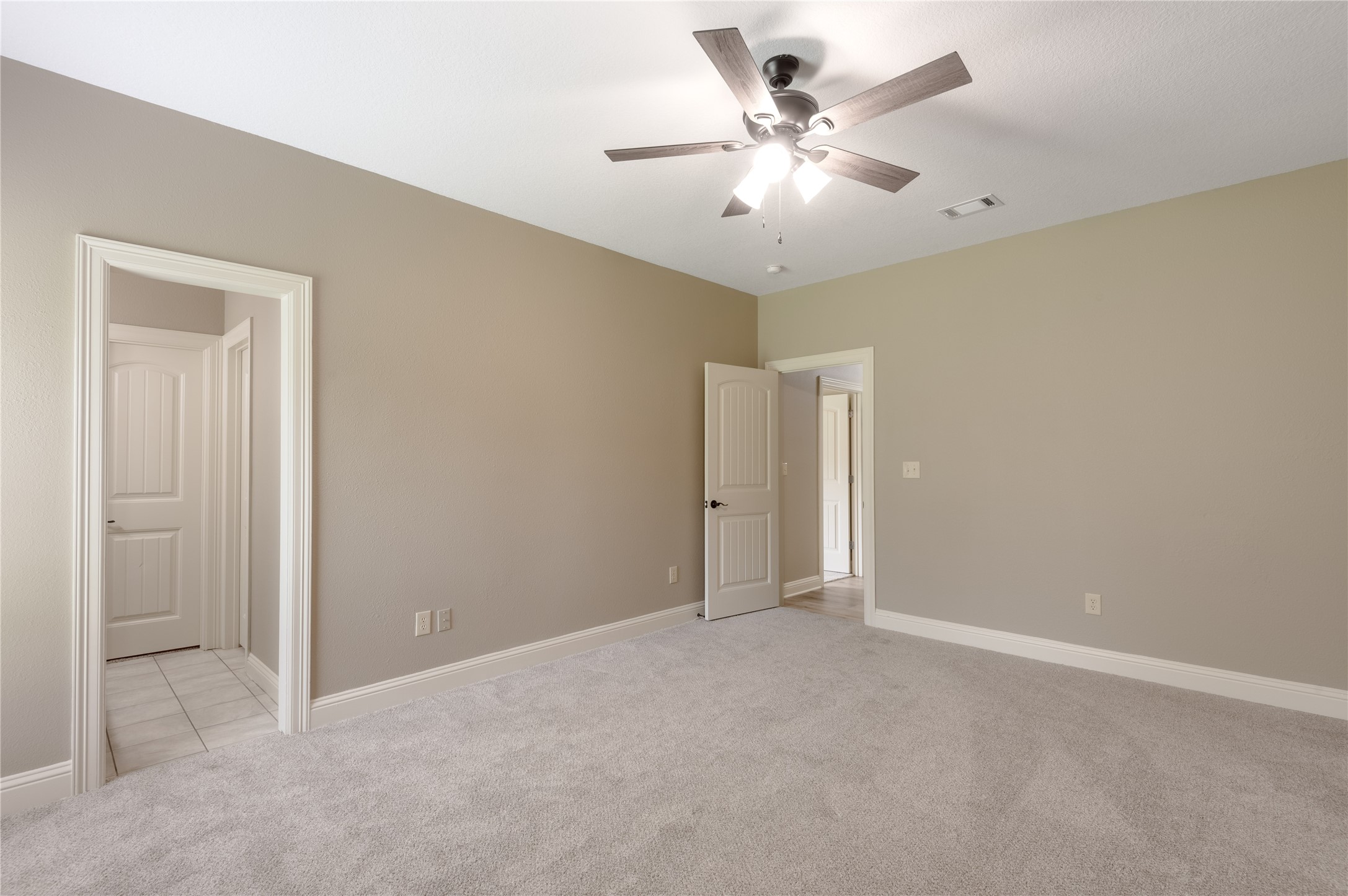 3134 Nursery Road Livingston, TX 77351 - Photo 35 of 50 an empty room with a ceiling fan and a window