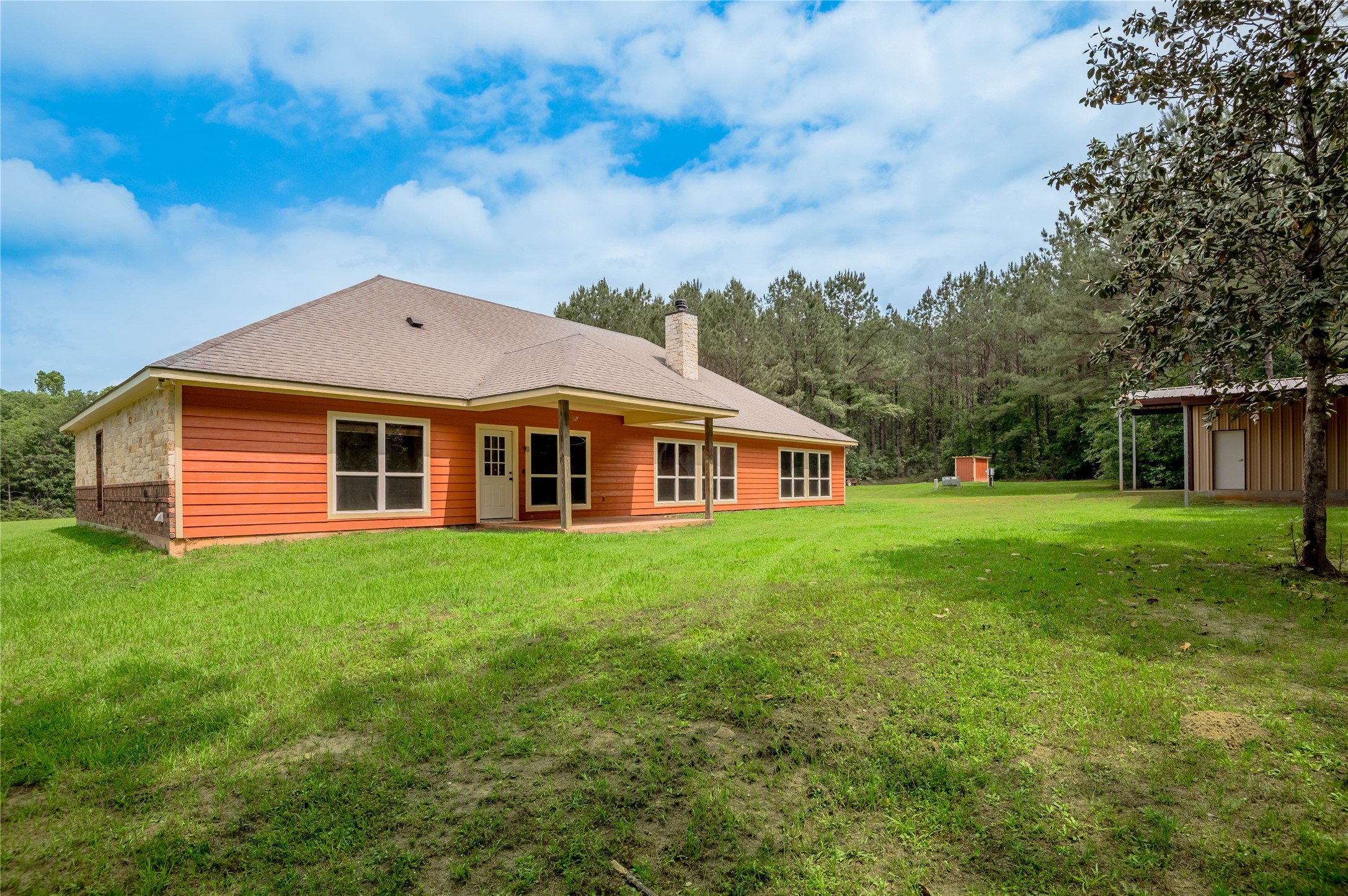 3134 Nursery Road Livingston, TX 77351 - Photo 38 of 50 a front view of a house with a yard