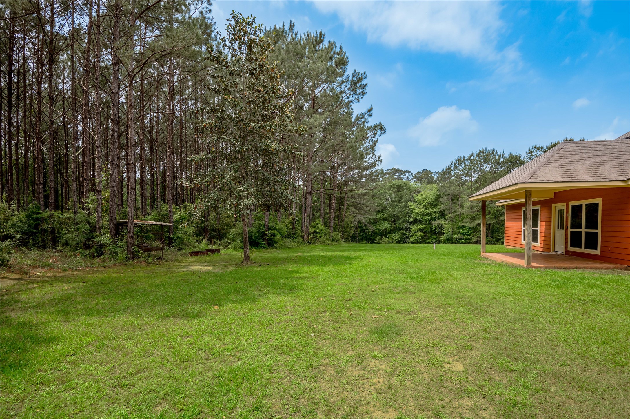 3134 Nursery Road Livingston, TX 77351 - Photo 41 of 50 a front view of a house with a yard