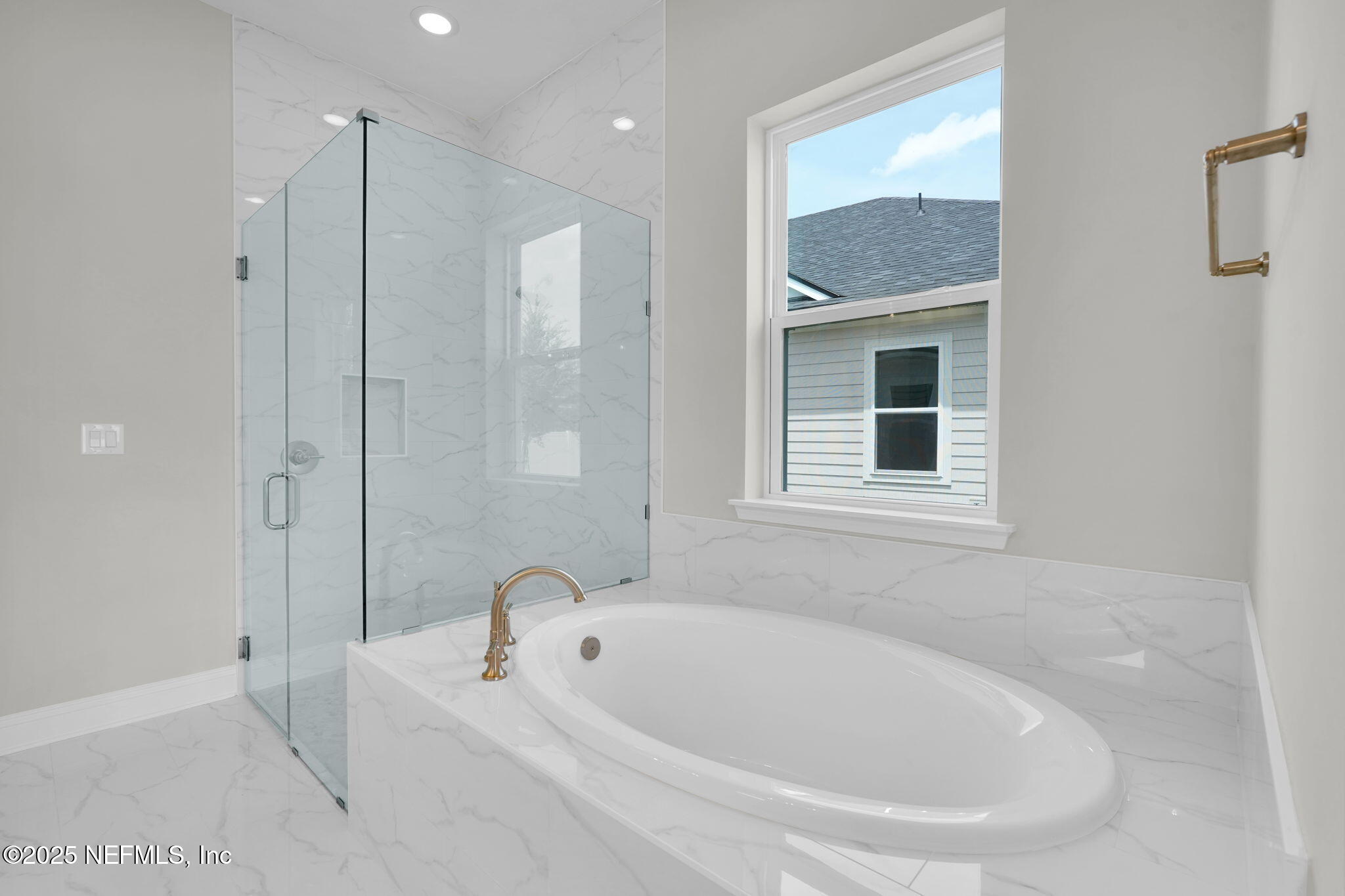 440 Slash Pine Place Yulee, FL 32097 - Photo 30 of 38 a white bath tub sitting next to a bathroom