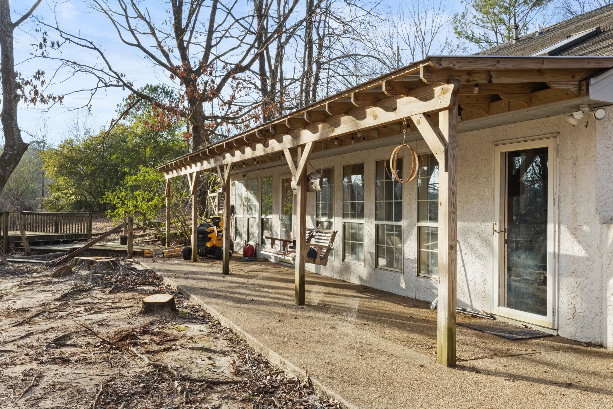 View of patio featuring a porch