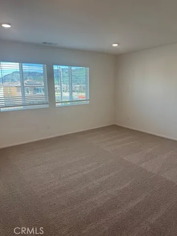 a view of a yard with an outdoor seating