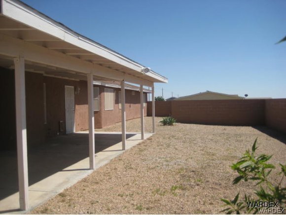 3437 Bacobi Road Golden Valley, AZ 86413 - Photo 17 of 17 a backyard of a house