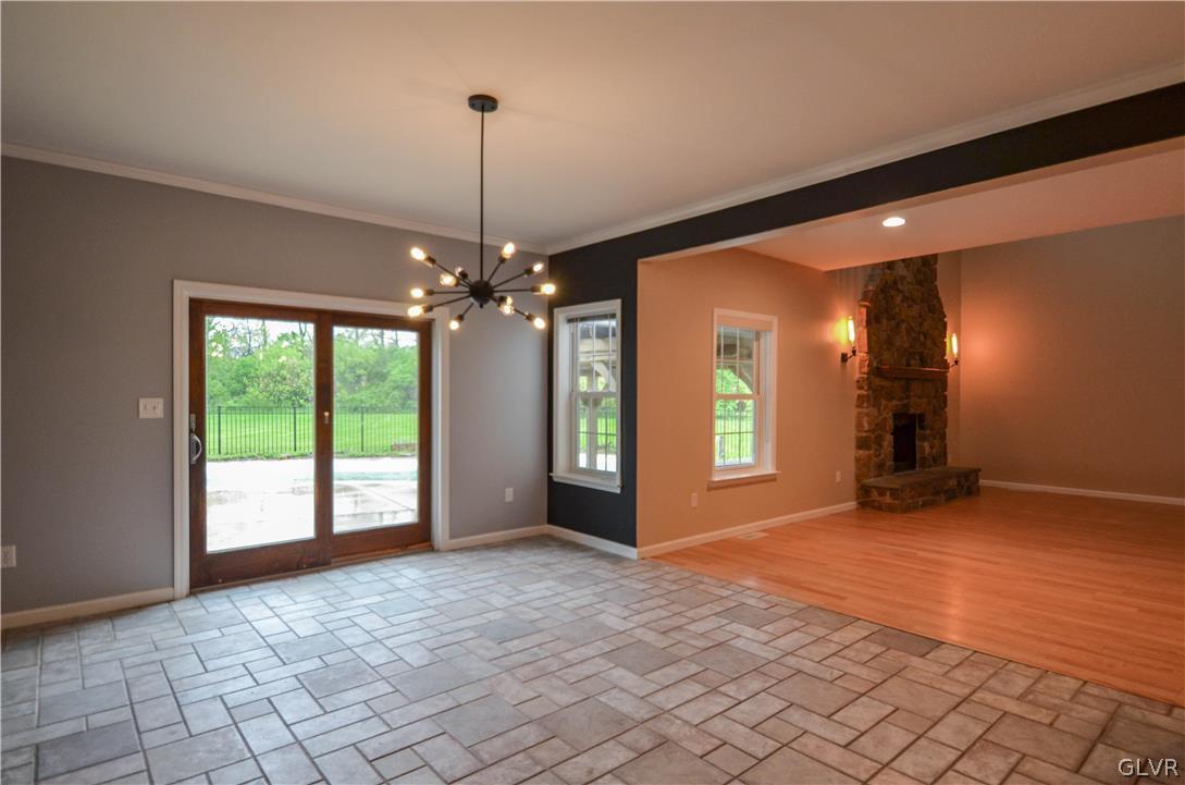 3190 Silver Crest Road Nazareth, PA 18064 - Photo 14 of 50 a view of an empty room with window and chandelier