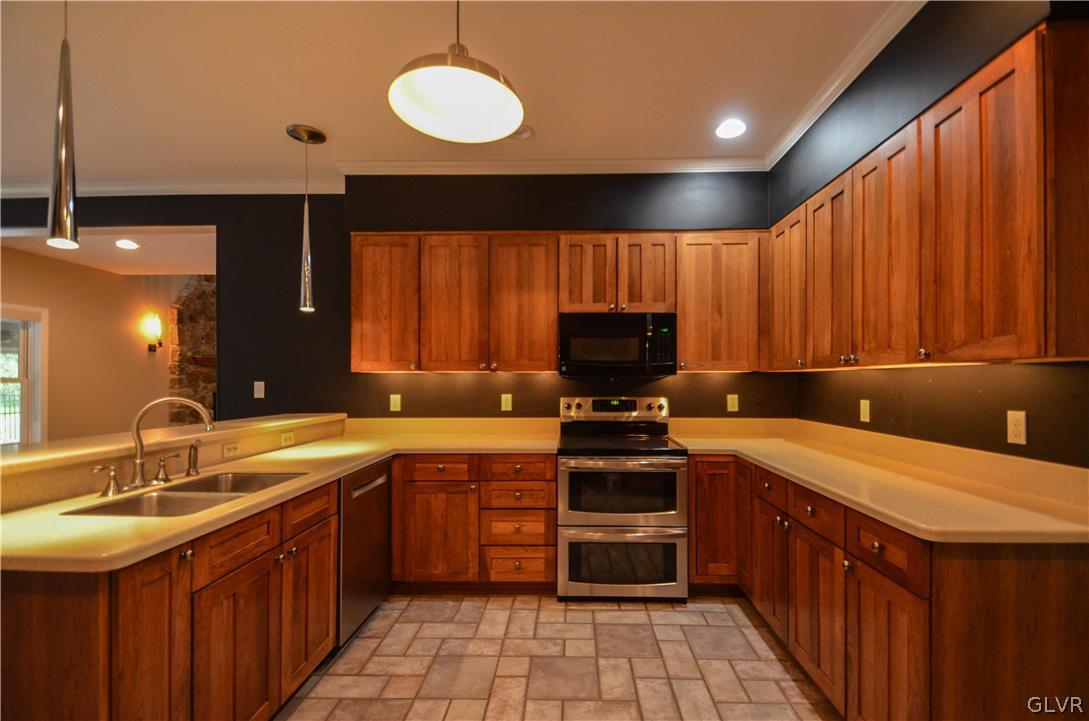 3190 Silver Crest Road Nazareth, PA 18064 - Photo 17 of 50 a kitchen with a sink and cabinets