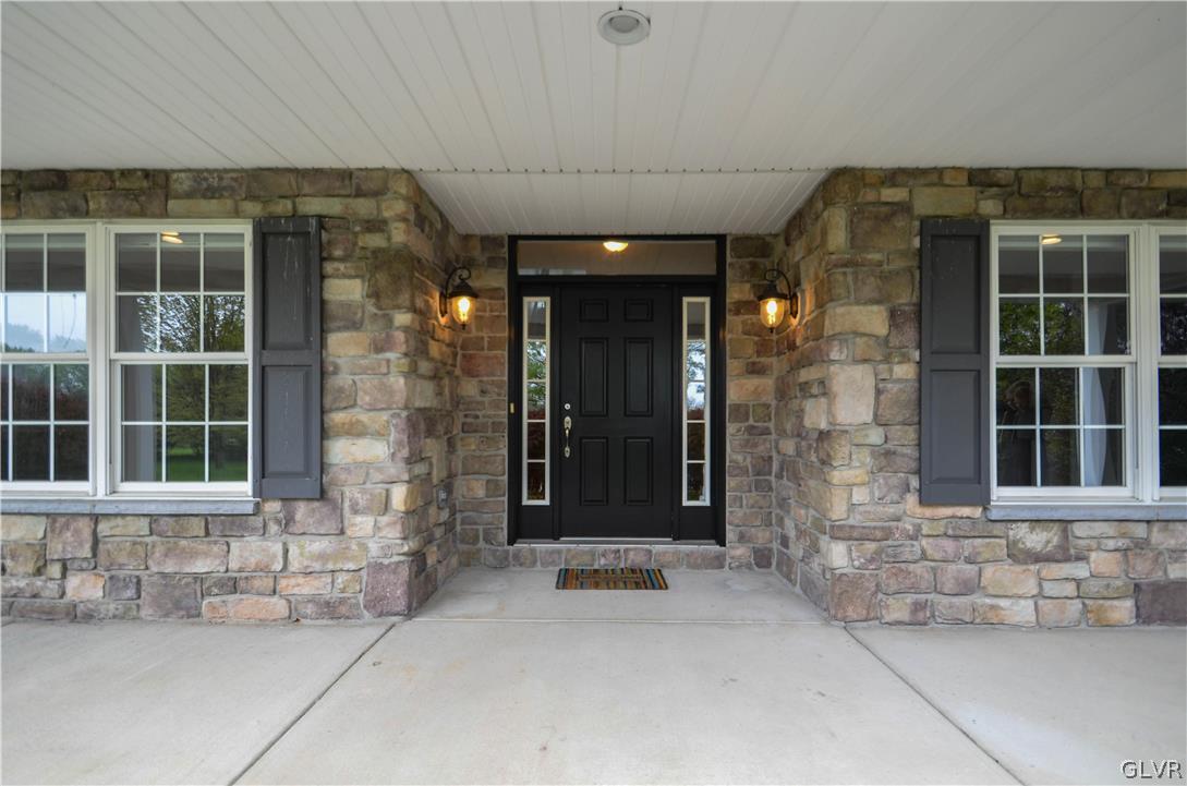 3190 Silver Crest Road Nazareth, PA 18064 - Photo 45 of 50 a front view of a building with a glass windows