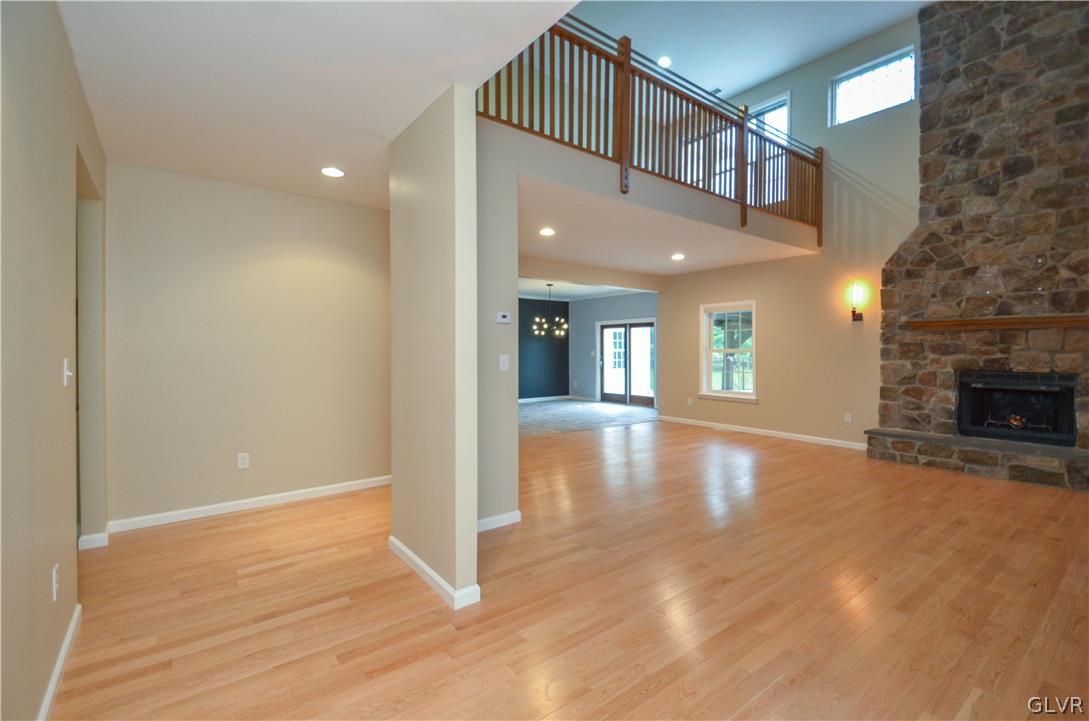 3190 Silver Crest Road Nazareth, PA 18064 - Photo 6 of 50 a view of livingroom with fireplace and hardwood floor