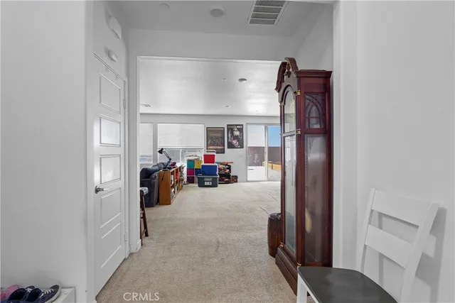 a view of livingroom with furniture and a window
