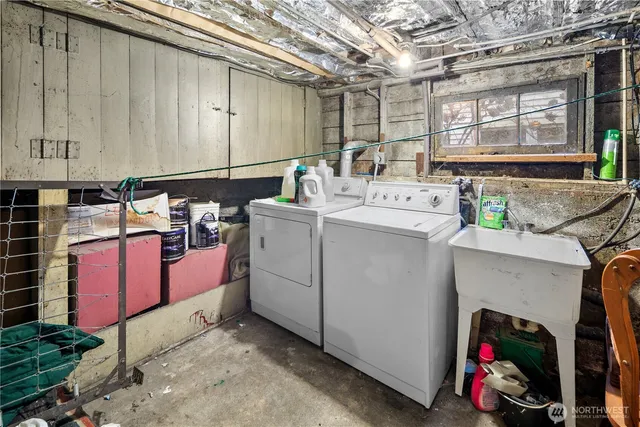 a utility room with dryer and washer