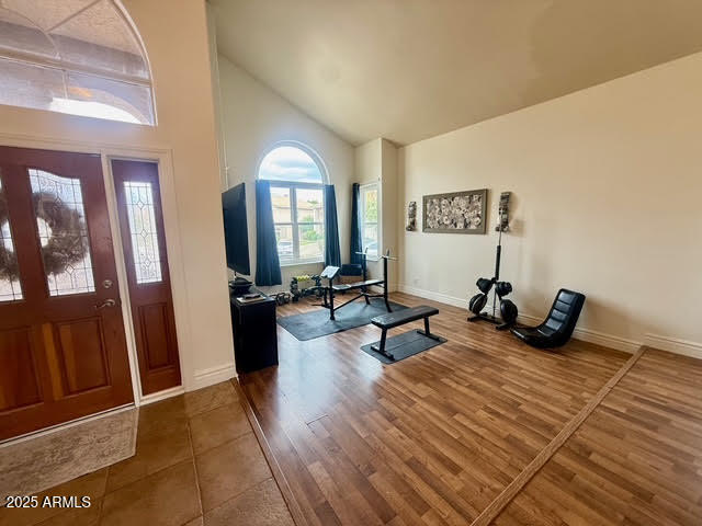 6743 East Tyndall Circle Mesa, AZ 85215 - Photo 14 of 27 a living room with furniture and a mirror