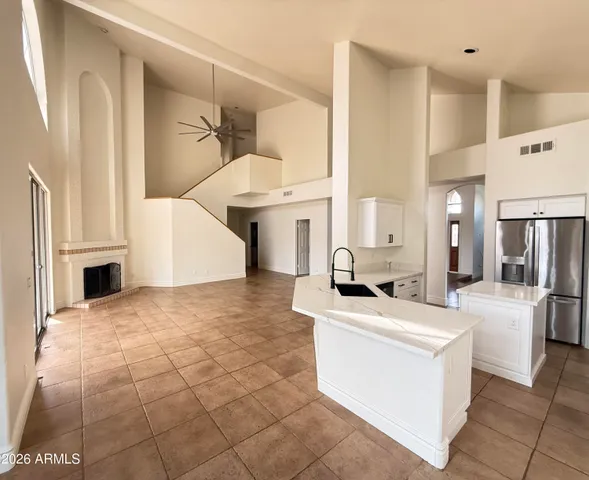 a view of a kitchen with furniture and a kitchen