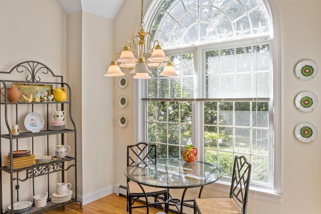29 Spruce Road Harwich, MA 02645 - Photo 14 of 41 a view of a dining room with furniture window and outside view