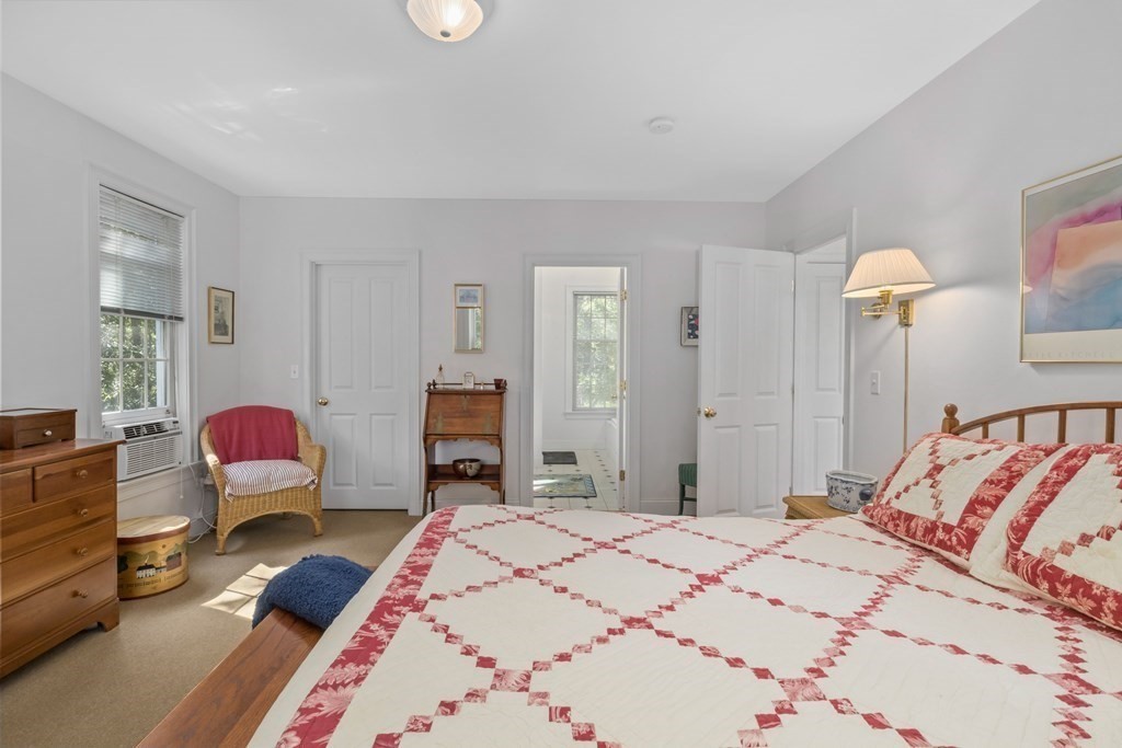 29 Spruce Road Harwich, MA 02645 - Photo 19 of 41 a bedroom with a bed and furniture