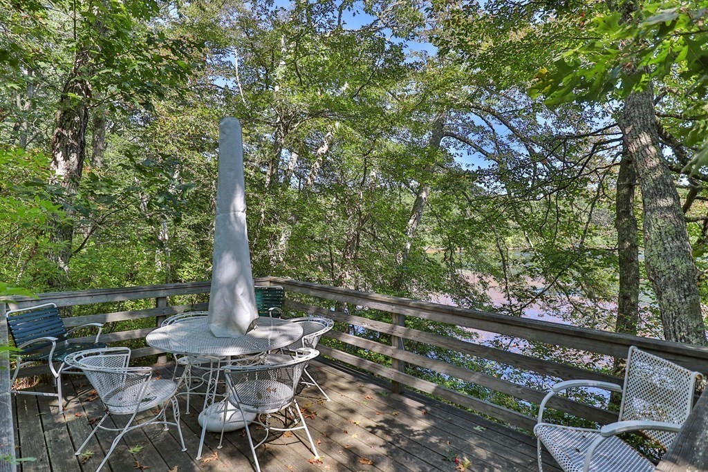 29 Spruce Road Harwich, MA 02645 - Photo 27 of 41 a view of a chairs and table in the patio