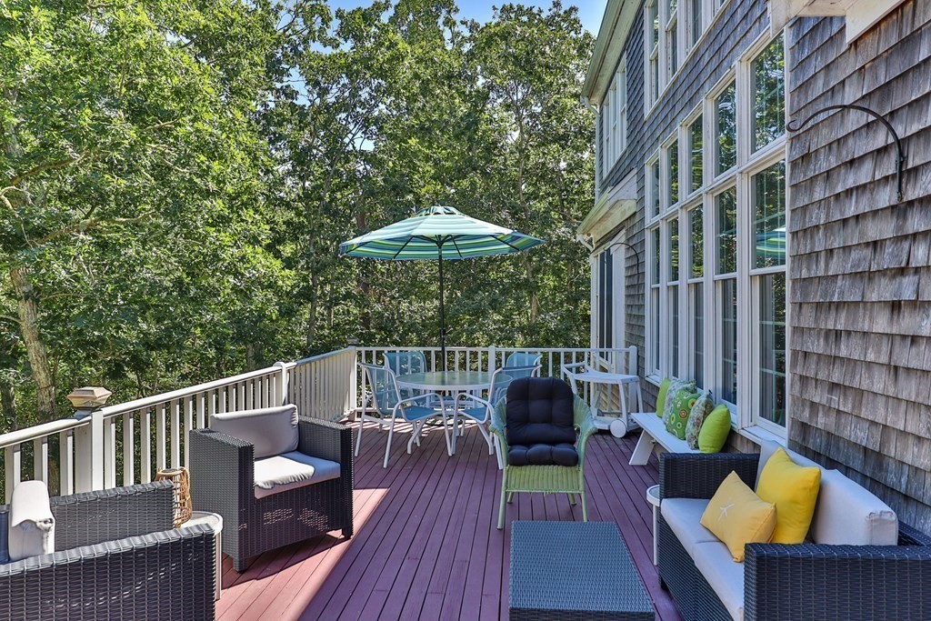 29 Spruce Road Harwich, MA 02645 - Photo 29 of 41 a view of balcony with furniture and wooden deck