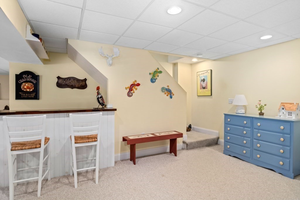 29 Spruce Road Harwich, MA 02645 - Photo 33 of 41 a living room with couch and a table