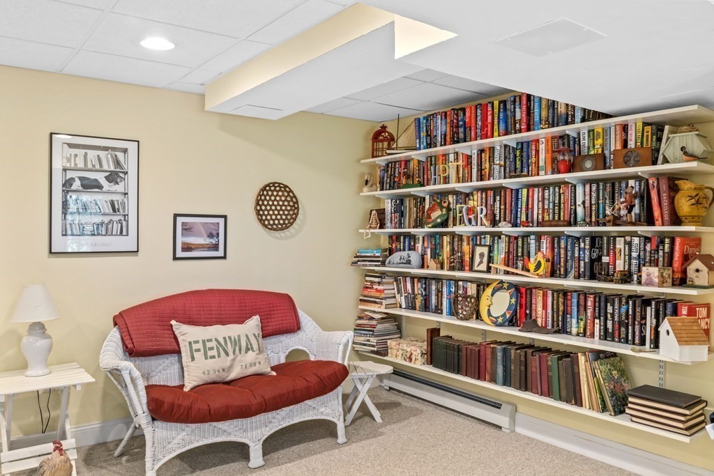 29 Spruce Road Harwich, MA 02645 - Photo 35 of 41 a book shelf with books and chairs