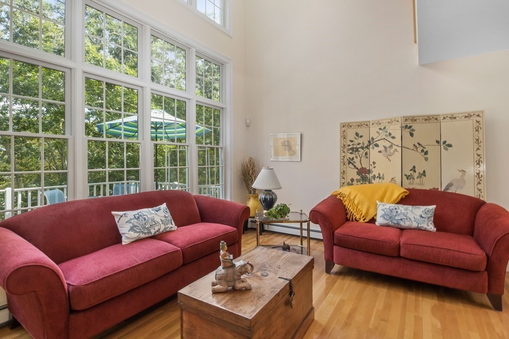 29 Spruce Road Harwich, MA 02645 - Photo 8 of 41 a living room with furniture and a wooden floor