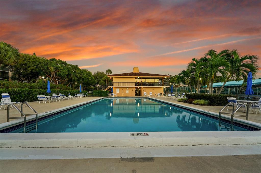 5340 Northwest 2nd Avenue, Unit PH26 Boca Raton, FL 33487 - Photo 41 of 53 a view of swimming pool with a yard